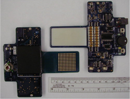 The PoNS device, viewed from the top (right) and the bottom (left). The array of 144 electrodes stimulates the tongue and, when used with particular exercises, is said to facilitate neuroplasticity in key motor areas of the brain. Image courtesy of Kimberly Skinner.]